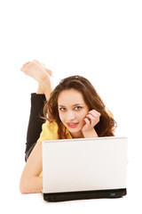 A young woman with a laptop posing