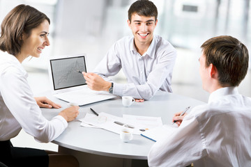 Businesspeople working at meeting