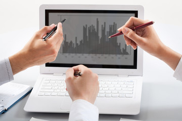 Businesswoman explaining a financial plan