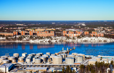 Refinery near urban settlements in Stockholm, Sweden. - obrazy, fototapety, plakaty