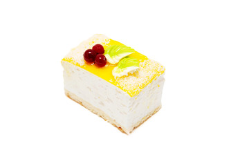 Souffle cake, decorated with coconut, cream and cranberries.