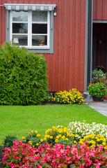 Fototapeta na wymiar Swedish front garden in summer season