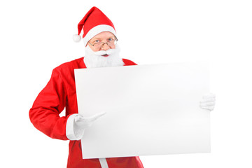 Naklejka premium santa claus with blank paper