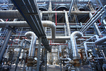 Pipes, tubes, machinery and steam turbine at a power plant