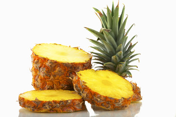 Fresh sliced pineapple isolated on white