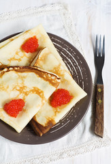 Pancakes with red caviar