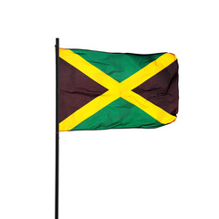 Jamaica flag in the wind and its pole on white. Photo.