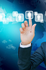 hand of business women pushing a button on a touch screen interf