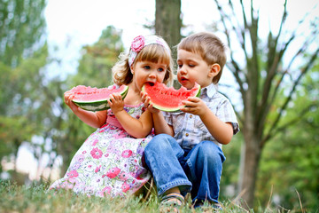 Two pretty kids with watermelon