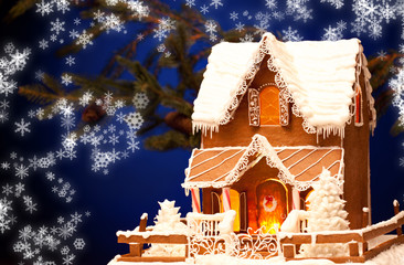 gingerbread house over christmas background