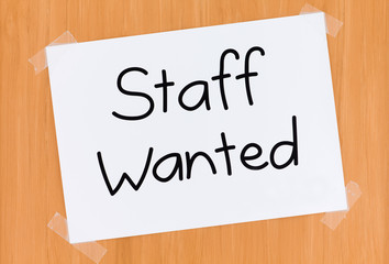 Sign on the Door Saying Staff Wanted