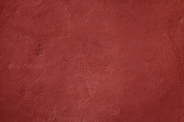 Old plaster wall texture background in Ochre City Marrakech, Mor