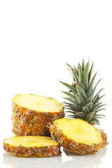 Fototapeta na wymiar Fresh sliced pineapple isolated on white