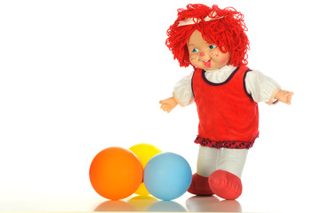 Fototapeta na wymiar Baby doll red dress and color ballons isolated white bacground
