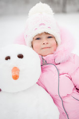 Child with snowman