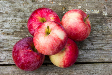 apples on an old wooden table