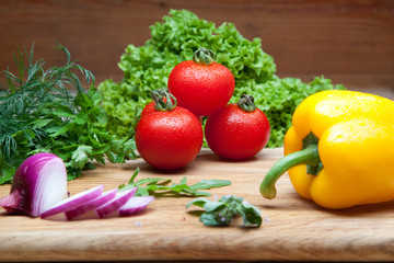 Fresh vegetables on cutting board.