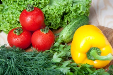 Fresh vegetables on cutting board.