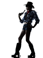 woman cowgirl shooting gun revolver
