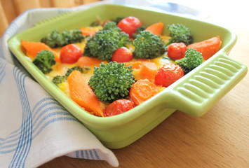 casserole with broccoli,cherry tomatoes and carrots