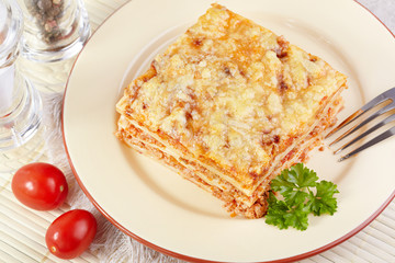 Italian cuisine. Meat lasagna  on the served table