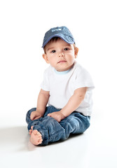 Little smiling boy isolated studio shot