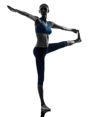 Fototapeta premium woman exercising yoga Hasta Padangusthasana