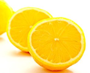 cut lemon on white background