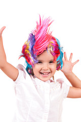 Little girl with colorful wigs