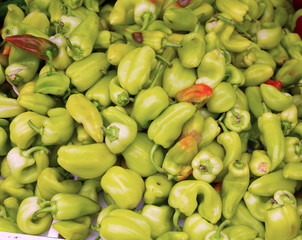 Green peppers in a market display
