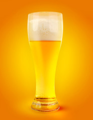 glass of light beer on orange yellow abstract background