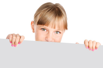 cute preteen girl holding a banner isolated over a white backgro