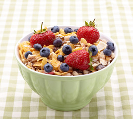 Bowl of healthy muesli and fresh berries