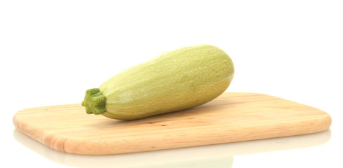 squash on a cutting board isolated on white background