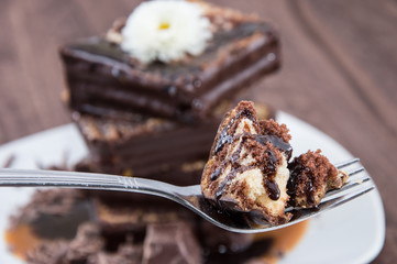 Piece of Cake on a fork with sauce