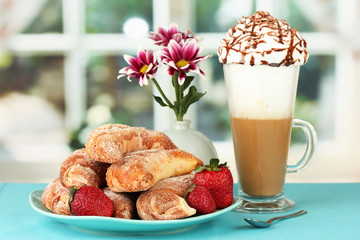 delicious bagels and fresh coffee on the table close-up