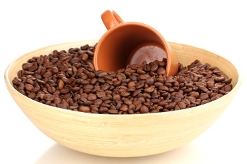 Coffee beans in bamboo bowl with cup isolated on white