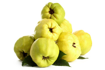 sweet quinces with leaves, isolated on white