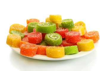 colorful jelly candies on plate isolated on white.