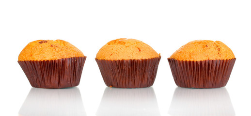 Fresh muffins isolated on white