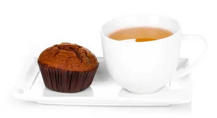Fotobehang Fresh muffin with tea isolated on white © Africa Studio