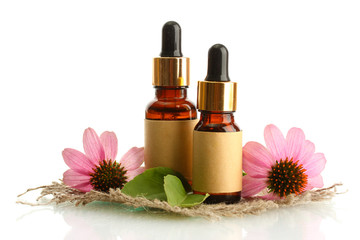 bottles with essence oil with purple echinacea , isolated