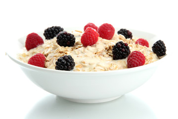 tasty oatmeal with berries, isolated on white
