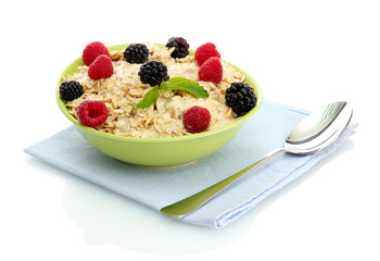 tasty oatmeal with berries, isolated on white