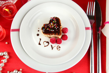 Plate with dessert in form of heart
