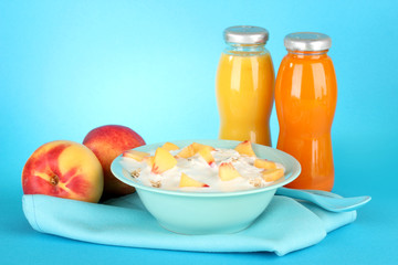 tasty dieting food and bottles of juice, on blue background