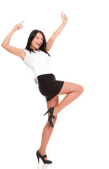 Obraz premium A joyous young female business executive celebrating success rai