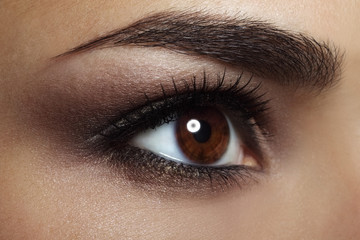 Obraz premium Beautiful female eye Makeup. close-up