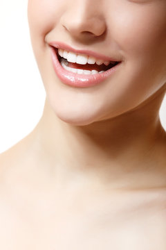 Beautifuk female smile with healthy perfect white teeth