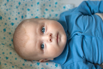 Adorable baby boy with blue eyes